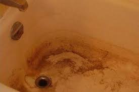 This white film makes your shower doors look dirty even when they are. How To Remove Rust Stains From Fiberglass Ehow Hard Water Stain Remover Cleaning Hacks Tub Cleaner