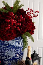 Stunning Red Velvet Hydrangea And Red Berries In Our Classic Blue And White Ginger Jars Christmas Flower Arrangements White Christmas Decor Christmas Floral