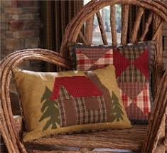 This bedroom's adorable wooden whale lamp works well with the fun viking pillow. Rustic Cabin Decor Pillows