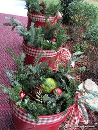 Create a home you love to live in, at prices you can't live without. How To Make A Christmas Porch Festive Bucket Decorations Diy Outdoor Christmas Beach Christmas Decorations Christmas Pots