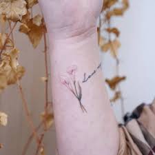 Tattoo design, like the nail art for women, is another great way to express oneself… Watercolor Calla Lily Tattoo On The Wrist