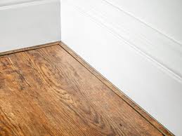 If the garage will still be used to store vehicles, smooth the transition between the raised flooring surface and the outside driveway by installing threshold strips of the appropriate size. A Guide To Door Thresholds What Are They How To Choose Them Stair Rods Direct