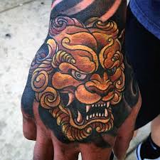 Black And Grey Foo Dog Hand Tattoo 61 Best Foo Dog Tattoos Design And Ideas Foo Dog Tattoo Design Foo Dog Tattoo Japanese Tattoo Designs