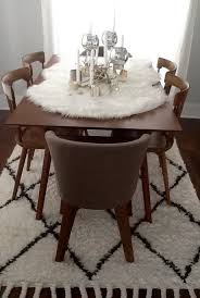Runners in luxurious fabrics such as velvet or silk provide an upscale look. Fur Table Runner Dining Room Table Centerpieces Dining Room Table Purple Dining Room Walls