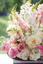 When you hire a professional florist for your wedding the vases, urns and containers they place the flowers. Pin By Jennie Herchenbach On Landscaping Gardening Pink Wedding Flowers Beautiful Flower Arrangements Cream Wedding Flowers