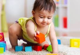 How Soon Can Your Baby Play With Stacking Blocks