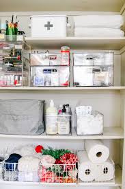 Imagine your tub filled with hot bubbly water and a glass of bubbly waiting for you to sip whilst you indulge in your peaceful and let's take each one at a time and think about some bathroom organization ideas that could help achieve your perfect relaxing oasis. Linen Closet Organization Makeover Modern Glam