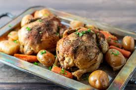 Into the cavity of each bird, insert a lemon half, an onion quarter, half a garlic head and 3 thyme sprigs. Slow Cooker Cornish Game Hens And Veggies For Two Zona Cooks