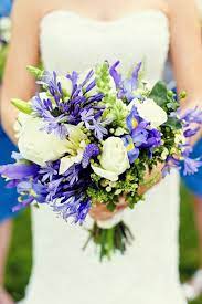 The iris is the official 25 th wedding anniversary flower, and a blue iris delivery for that special couple to celebrate their love will be cherished and remembered for years to come. Country Wedding At Applford In Villanova Pa Rustic Wedding Chic Spring Wedding Flowers Wedding Bouquets Iris Wedding