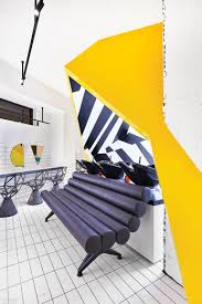 They have carved a niche in the beauty industry by providing committed, caring and personalised services. Studio Svetti Architecture Goes Geometric For A Camucia Italy Hair Salon Interior Design Yellow Salon Interior Design Interior Design Magazine