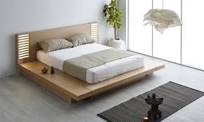 The white bed sheet looks contrasting to the dark wooden bed frame and small cabinet beside it. Zen Style Interior Design Ideas For A Serene Home Design Cafe