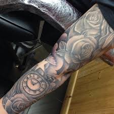 This pair of religious tattoos veer from strict tradition. Tattoos By Craig Holmes Iron Horse Tattoo Studio Religious Sleeve W Pocket Watch All Healed Apart