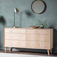 A tall chest of drawers is perfect for this purpose. Milano 6 Drawer Chest Wooden Chest Of Drawers Large Chest Of Drawers