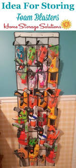 Used various hooks, wood screws, and nails to mount the guns. Nerf Storage Organization Ideas For Blasters Accessories