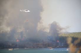 Sky of side, turkey is filled with smoke from a huge wildfire. Azockwfgbjsfdm