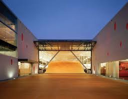 Video And Photo Gallery Of Construction Of Red Bull Corporate Headquarters Brewery Interior Glass Bifold Doors Glass Garage Door