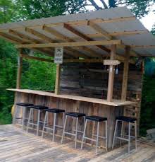 An outdoor bbq area is an outdoor kitchen or its mini version: 43 Classy Outdoor Bar Ideas You Ll Love Decoarchi Com Diy Outdoor Bar Backyard Bar Outdoor Kitchen Design