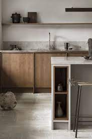 This modern nordic kitchen has a gray granite countertop with pure white cabinets and gray backsplash. Kitchen Modern Kitchen Design Kitchen Design Color Kitchen Style