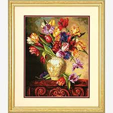 I've stitched another couple of anself cross stitch projects since finishing this one, i use two strands of thread, and soak in cold water to remove printing and have had no dye run at all. Amazon Com Dimensions Gold Collection Counted Cross Stitch Kit Parrot Tulips 14 Count Black Aida 12 X 15
