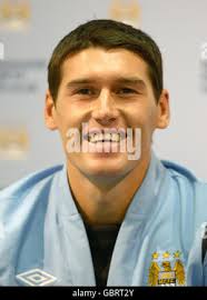 Manchester City's new signing Gareth Barry talks to the media during a  press conference at the Emirates Palace Hotel, Abu Dhabi, United Arab  Emirates, Thursday July 16, 2009. Despite last winning a