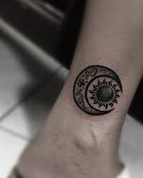 50 Meaningful And Beautiful Sun And Moon Tattoos Kickass Things Moon Sun Tattoo Moon Tattoo Designs Moon Tattoo