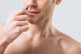 If you have unwanted facial hair, plucking offers a cheap and effective way to deal with this problem. Cropped View Of Man Plucking Hair With Tweezers From Nose Isolated On Grey Free Stock Photo And Image
