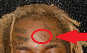 Another option is to have the stunning savanna. Lil Wayne Shows Off New Africa Pride Continent Tattoo On His Forehead At Halloween Party