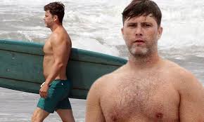 Colin kelly jost is an american comedian, actor, and writer. Colin Jost Models His Buff Torso As He Is Seen Surfing Off The Coast In The Hamptons Daily Mail Online