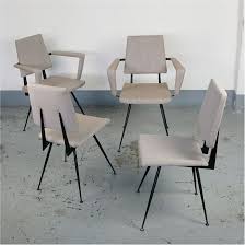 Just look at that ergonomic silhouette! Set Of Four Grey Italian Midcentury Black Metal Dining Chairs By Velca Legnano