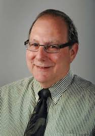 Memorial trees and plaques around city parks pay tribute to good lives