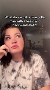 Blue Collar Man with A Beard and Backwards Hat