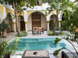 On the ground floor there are living and dining room, kitchen, garage and secondary rooms. Courtyard Or Atrium As Part Of A House