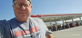 Psycho here. It's a windy one as I depart Stuart, Iowa. They've built a new  Kwik Star convenience store along the south side of Interstate 80. They are  loaded with gas stations.
