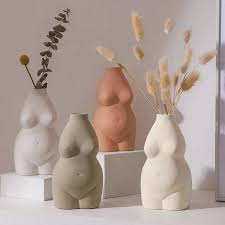 Keeping the vase's water at a consistently cool temperature naturally prevents algae from forming that can prematurely cause flowers to wilt. 21 Cool Vases To Decorate Your Space Hand Blown Glass Ceramic Pottery More Glamour