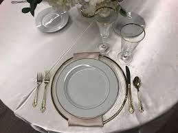 It took a while but it was worth it. Actual Table Setting Alpine Textured Clear Glass Chargers White Plates W Gold Rim Gold Flatware Gold Rimmed Drinkwa Gold Flatware Glass Charger Gold Rims