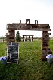 The chunky posts on this arbor really make a statement, and creates a beautiful entryway onto the garden patio. Beautiful Diy Wedding Arches Wood Wedding Days
