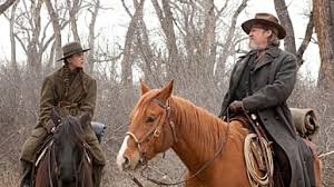 Marshal and a texas ranger help a stubborn teenager track down her father's murderer in indian territory. True Grit The Coen Brothers Great Adaptation