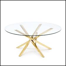 A small round gilt metal coffee table with clear glass top. Coffee Table With Base In Metal In Gold Finish 162 Eclipse Pacific Compagnie