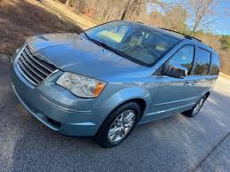 Image result for Light Ice Blue 2009 Town Car