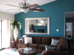 Incridible Blue Paint Living Room Design With Brown Leather Sofa And White Ceiling Light Idea Hfec Brown Living Room Decor Teal Living Rooms Aqua Living Room