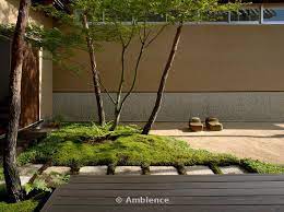 Courtyard garden with limestone patio with hardwood deck and framed japanese maple this small courtyard features pale limestone paving in combination with bespoke benches and hardwood decking, which continues up the wall to provide a visual frame for the red acer. Japanese Gardens Off Deck On North Side Leading To Nature Playground What I Japanese Garden Japan Garden Front Yard Landscaping