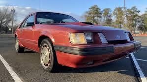 Image result for Medium Canyon Red 1984 Mustang