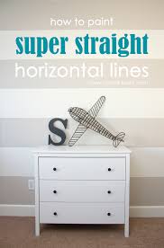 An accent wall is an interior or exterior wall that can have a different color, shade, design or material from the other walls around it. How To Paint Super Straight Horizontal Striped Lines On A Wall