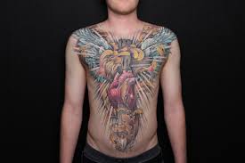 Each has special meaning and significance and is truly beautiful. Heart Cross Sword And Wings Chest Piece By Aaron Della Vedova Tattoonow