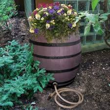 Rescue 50 Gal Brown Flat Back Whiskey Rain Barrel With Integrated Planter And Diverter System With Black Accent Bands 2243 1 Rain Barrel Barrel Planter Rain Collection System