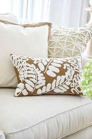 Couch pillows come in all shapes and sizes—literally. 5 No Fail Tips For Arranging Pillows Stonegable