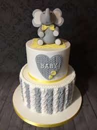 For all your elephant baby shower theme invitations, games, and decorations check us out at elephant baby shower. Knitted Effect Baby Shower Cake With Elephant Topper Grey And Yellow Theme Elephant Baby Shower Theme Baby Shower Yellow Elephant Baby Shower Cake