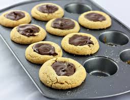 Peanut Butter Nutella Cookie Cups Hummm I Bought A Mini Muffin Pan This Looks Like A Good Us Peanut Butter Nutella Cookies Nutella Recipes Nutella Cookies