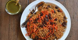 Lamb kabuli $ 37.00 traditional afghan rice cooked and flavoured with lamb stock, cumin powder+ cardamom filled with pieces of lamb on bone topped with a layer of julian caramelized carrot, sultana and almond nuts served with lamb kurooti. What To Eat At This New Afghan Restaurant In Beverly Hills Eater La
