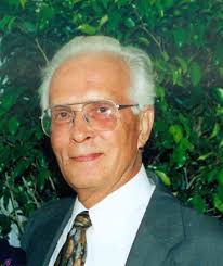 NAS' John Romer Dies